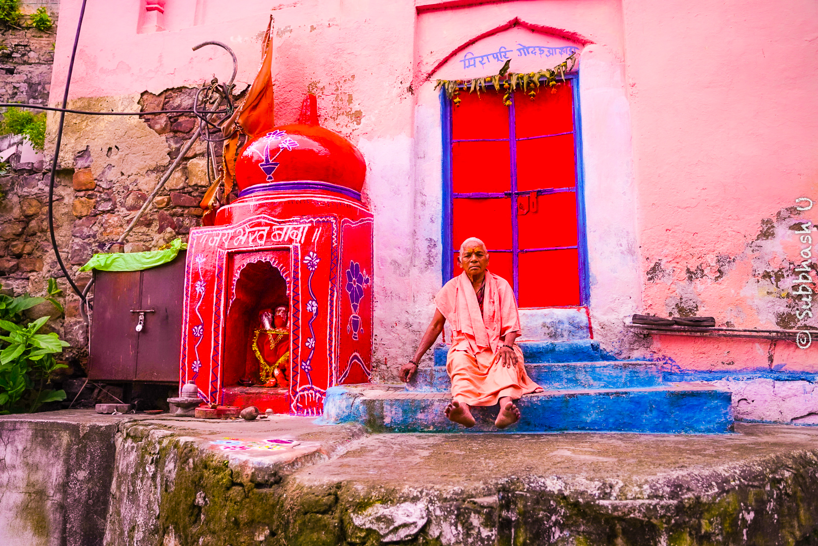 A Lady Looks on while visiting माँ नर्मदा, Omkareshwar, MP